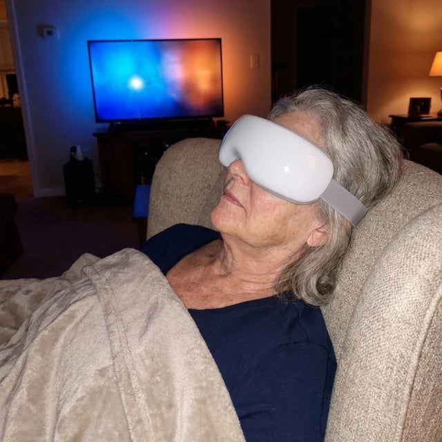 Customer relaxing with device on couch